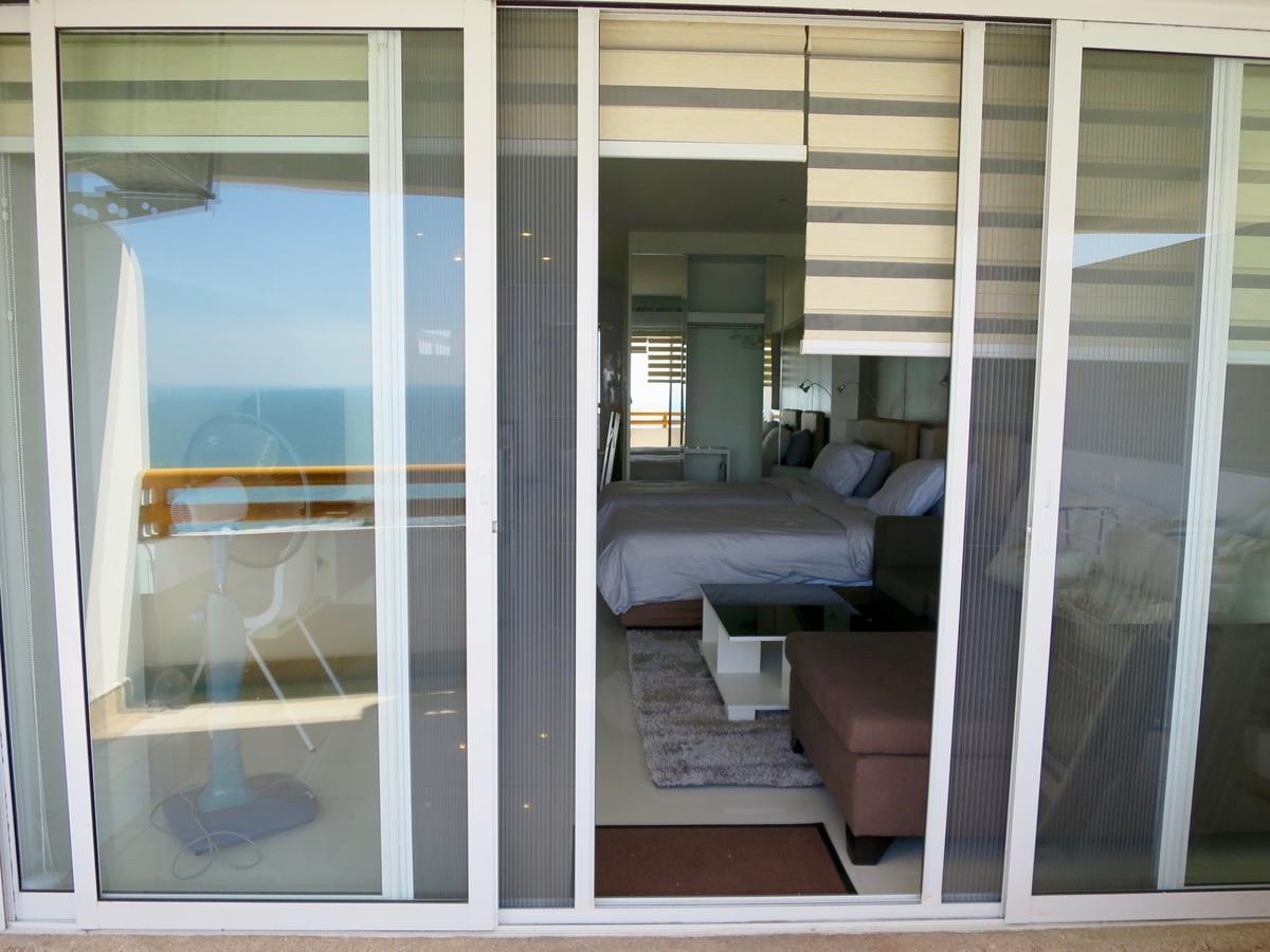 Sunshine Beach Condotel By Lux Praia de Jomtien Exterior foto